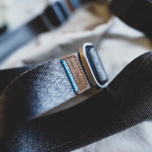 a close up of a belt on a bed