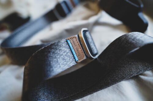a close up of a belt on a bed